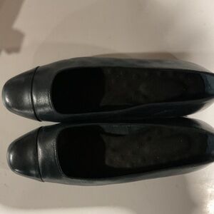 Woman’s blue “flats” size 8w